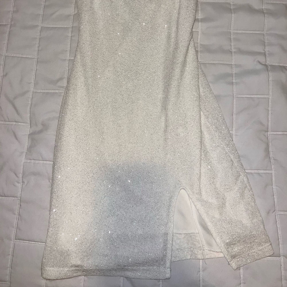 White glittery mini dress.